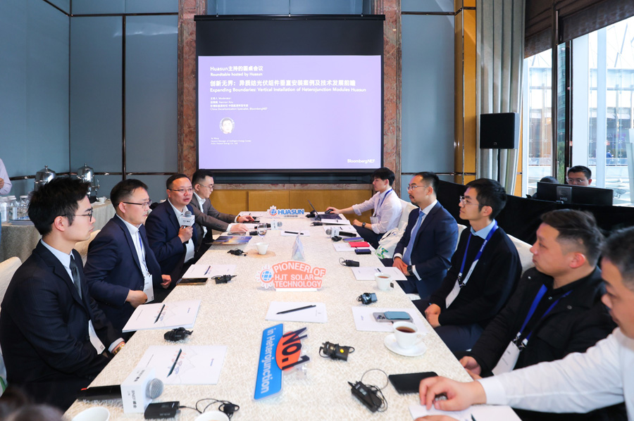 Huasun-Presents-Key-Benefits-of-HJT-Vertical-Installation-for-Traditional-Industries-at-BNEF-Summit-Shanghai-2024-01.jpg